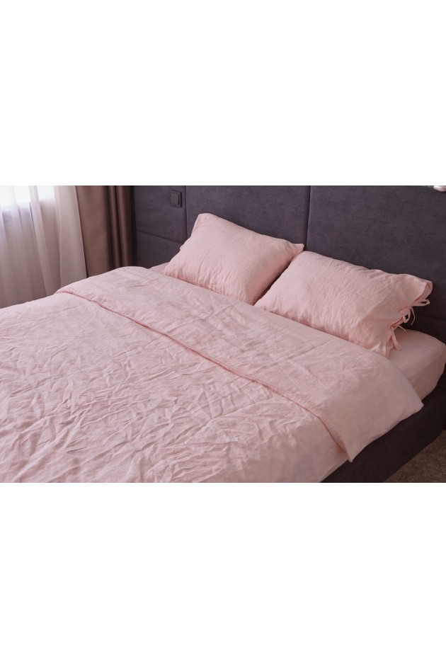 Pink bed made of clean linen