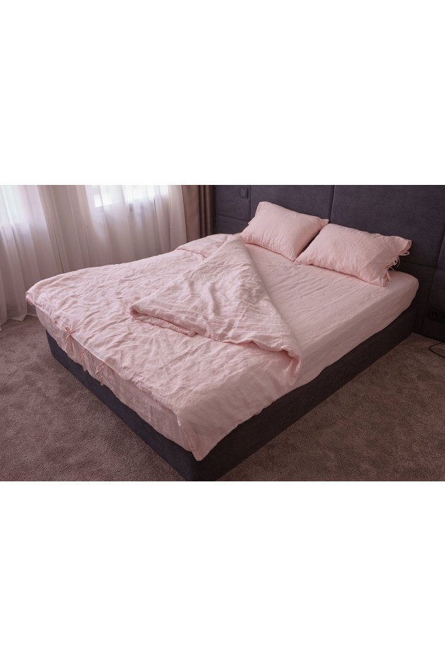 Pink bed made of clean linen