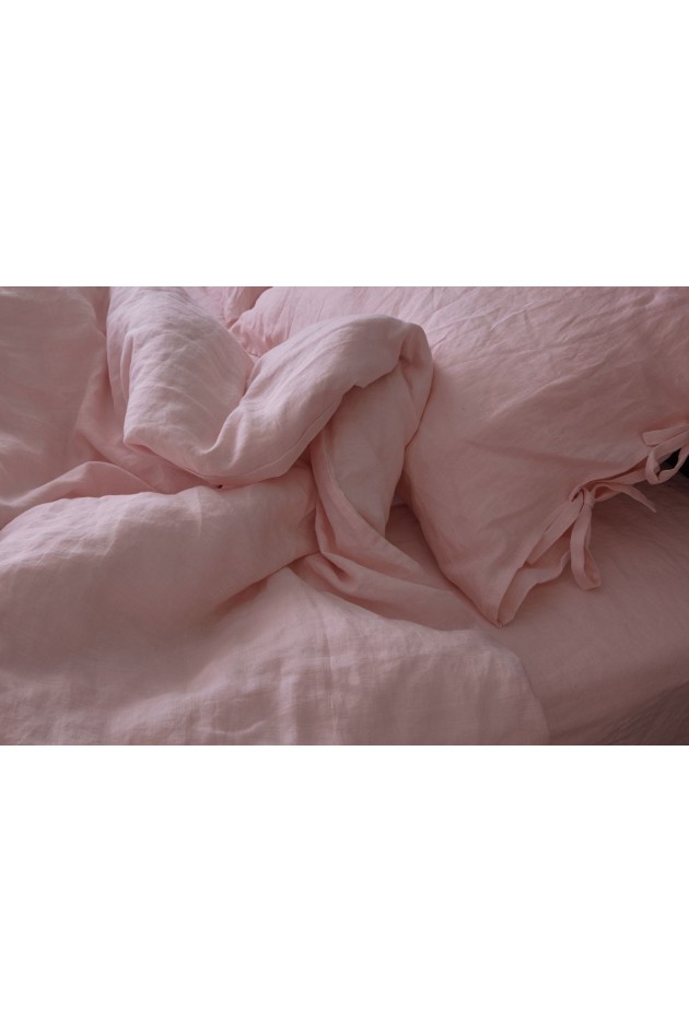 Pink bed made of clean linen POST-10009