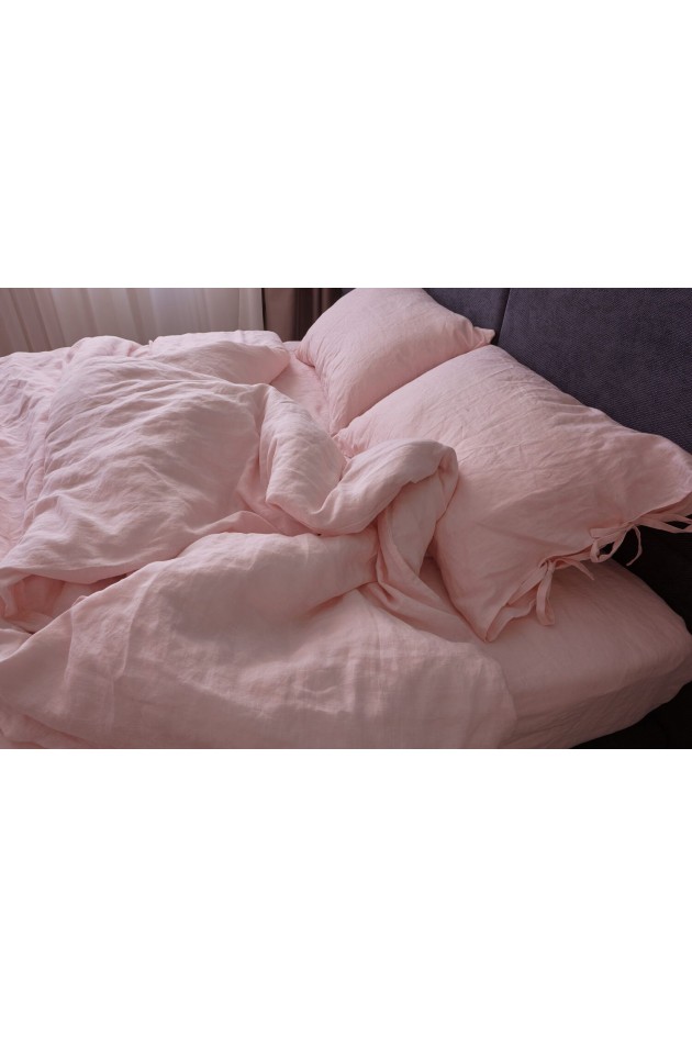 Pink bed made of clean linen POST-10009